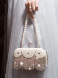 Socialite Pearl Tassel Clutch - A Statement Bag